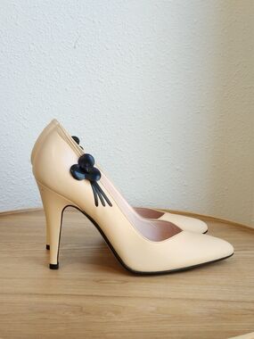 Jill Stuart Cream Pointed-Toe Pumps with Black Floral Accent